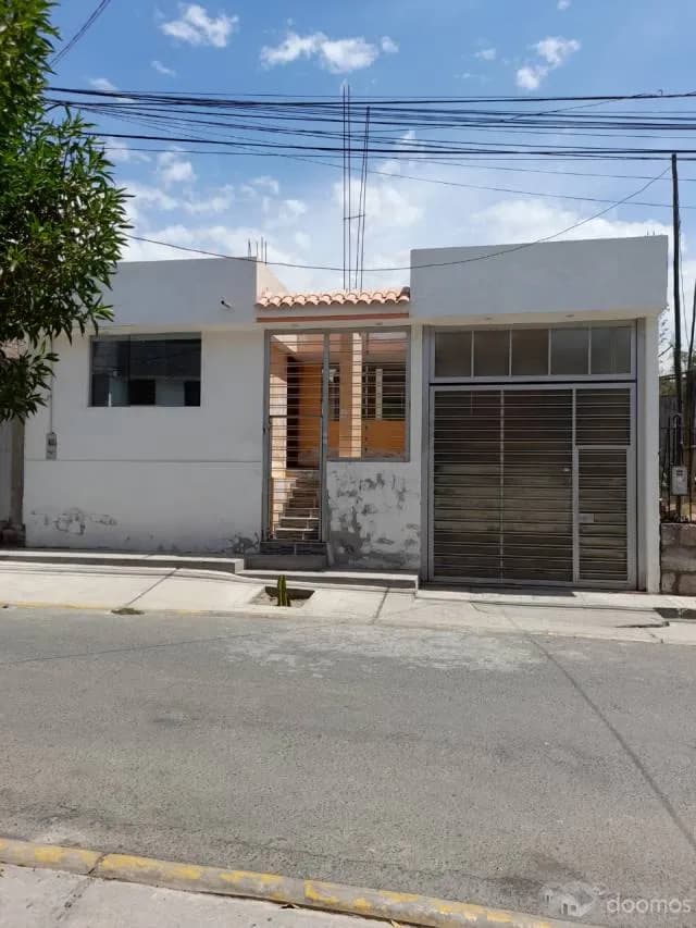 Venta del 50% de acciones de una casa (con inquilinos precarios) — foto 1