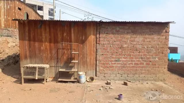 REMATE DE TERRENO CON CASA PREFABRICADA (Dos cuartos) — foto 1