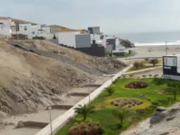 OCASIÓN, TERRENO EN EL EXCLUSIVO CONDOMINIO CLUB PLAYA LAS PALMERAS